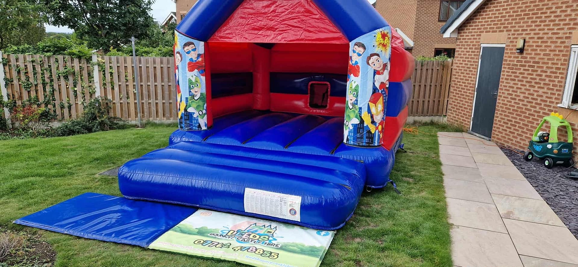 Superhero Bouncy Castle – Blue & Red - Image 2